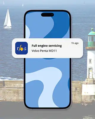 Push notification for a Ready4Sea maintenance reminder in front of a sailboat and a lighthouse